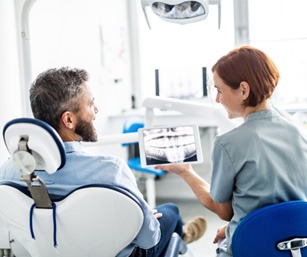 : patient talking to dentist