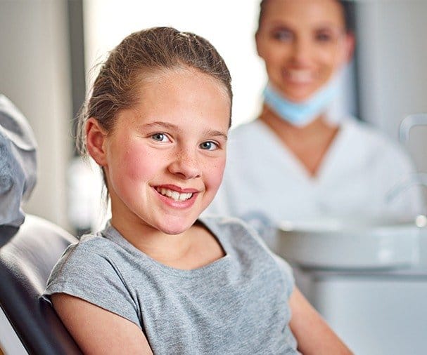 Smiling child in dental chair