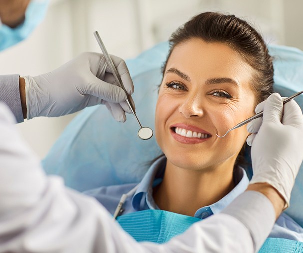 Female patient smiling in the treatment chair