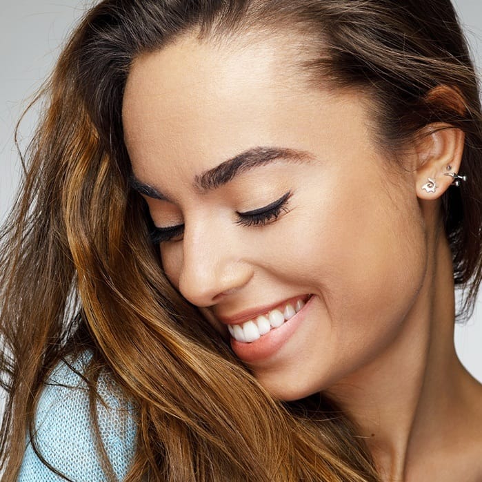 Young woman with flawless smile