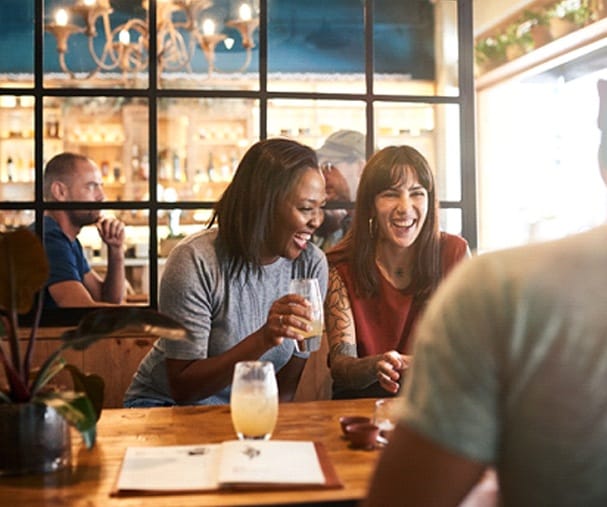 friends having drinks together in a restaurant