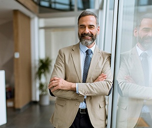 Man smiling at office