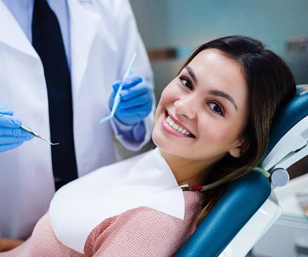 Woman visiting dentist to treat a toothache in Sparta