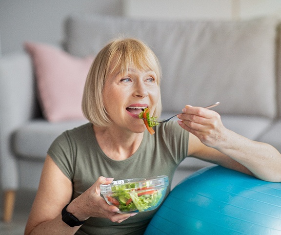 Woman eating a salad