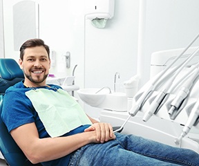 Bearded man sitting back in dental chair