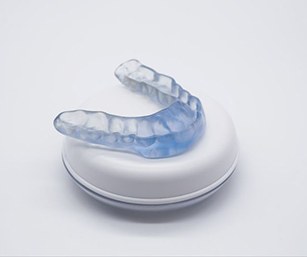 Occlusal splint featured against neutral background