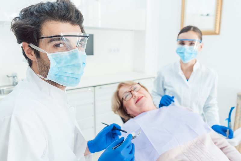 Dentist in Sparta wearing PPE