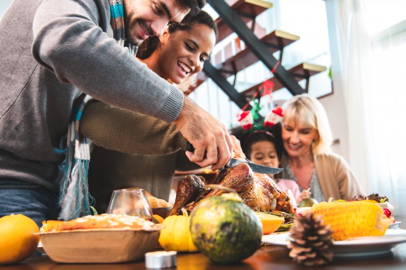 a family enjoying holiday foods in Sparta