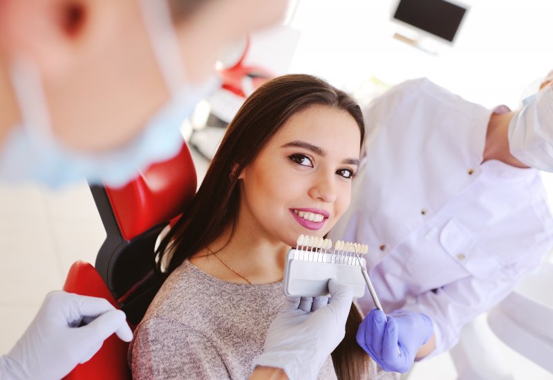 a young woman being fitted for veneers