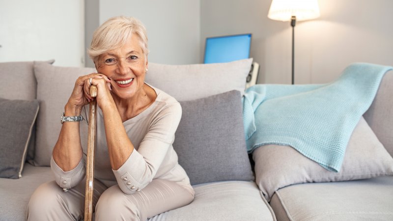 Smiling seniors with their dentures